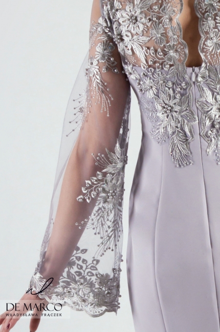 Niepowtarzalne sukienki na wesele szyte na miarę u projektantki sukienek Agaty Dudy. Srebra sukienka dla 60 latki, 50 latki, 40 latki dostępna w sklepie internetowym De Marco.