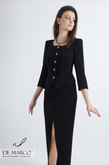Elegant women's suit with a long skirt. Black formal set