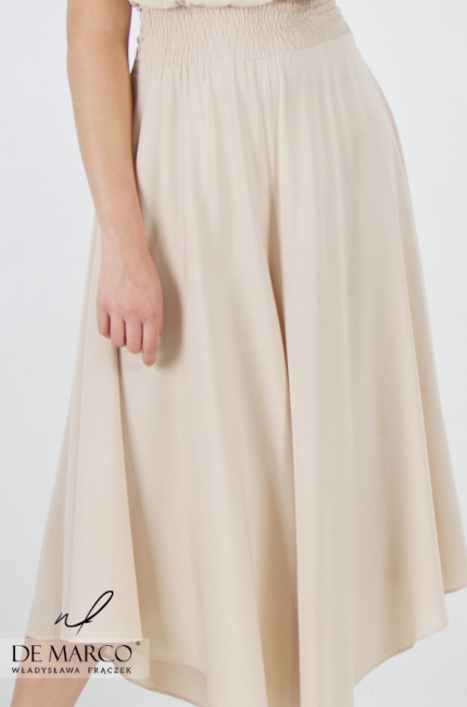 Airy elegant beige wedding styling. Women's beige jumpsuit with carmen neckline