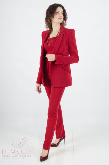 Luxurious evening formal suit with an asymmetric one-shoulder top. Fashionable women's pantsuit in the color of 2023