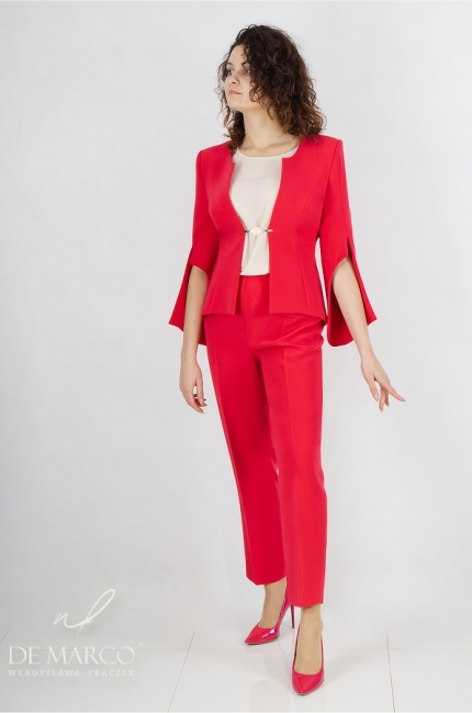 Modern elegant women's red suit. The most fashionable women's suits from the Polish designer Władysława Frączek De Marco