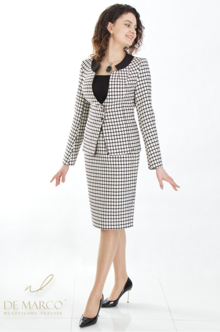 Business suit in black and white sewn in Poland. Fashionable checkered businesswoman costumes. Tailor made by De Marco