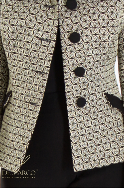 A black and gold business formal set from the Polish designer Władysława Frączek De Marco
