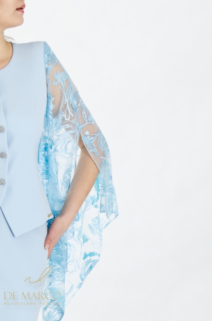 Original styling in shades of blue. Women's formal suit for family celebrations. The most beautiful styles with a skirt and airy sleeves. Polish producer De Marco