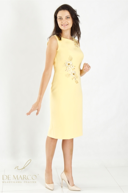 A stylish, sleeveless, yellow formal dress adorned with embroidery. Made to measure by De Marco.