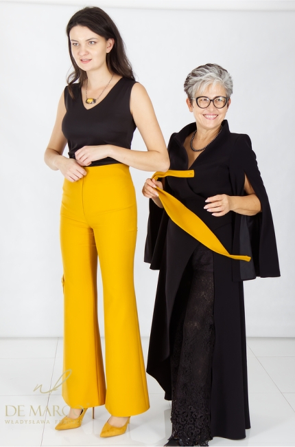 Nowoczesne żółte spodnium z marynarką zdobioną szalem i spodniami high-waist z poszerzanymi nogawkami. Szycie na miarę De Marco